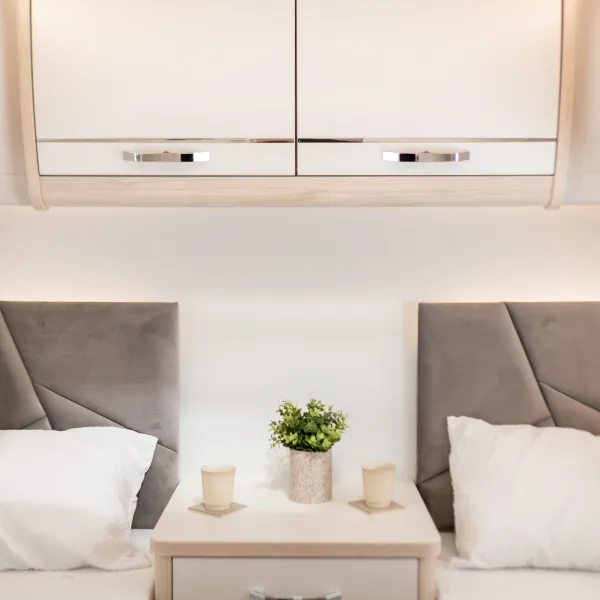 Image of the sleeping area inside a crusader caravan.