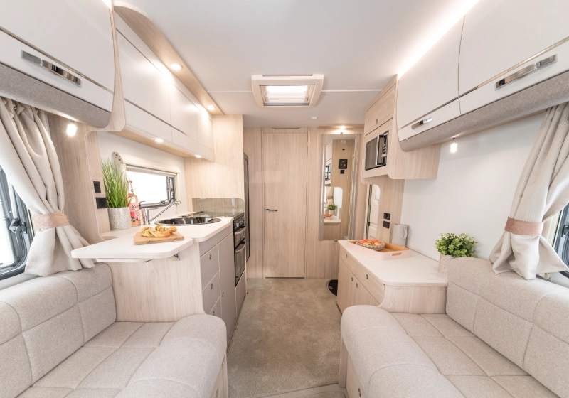 Interior image of the Elddis Whirlwind. It shows the lounge and kitchen area.