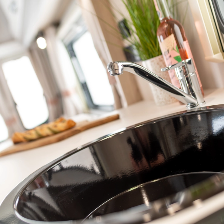 Image of the kitchen sink inside the Whirlwind 520 model by Elddis.