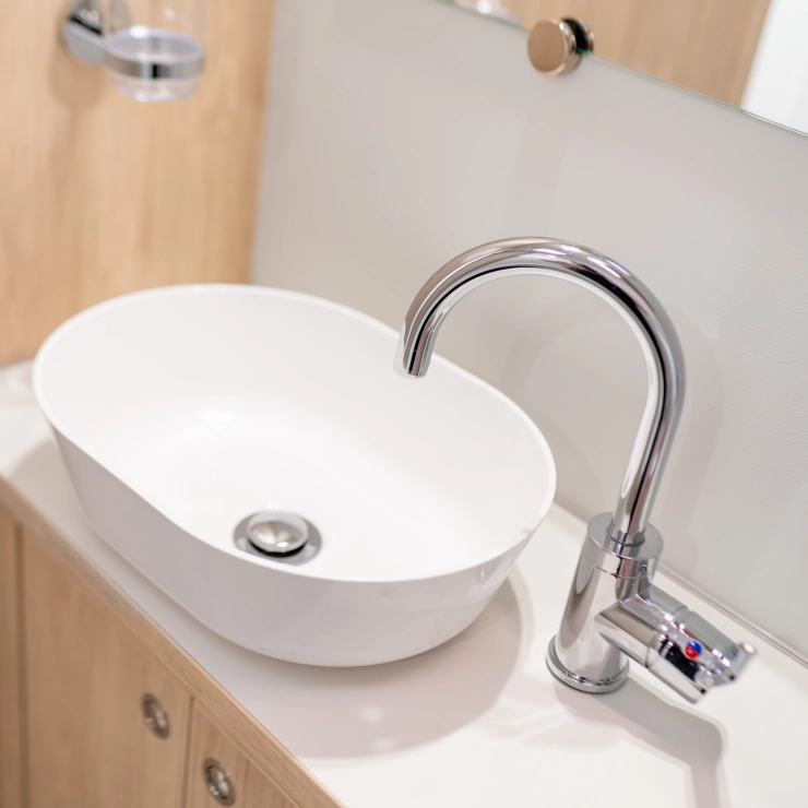 Image of the bathroom sink inside the Whirlwind 520 model by Elddis.
