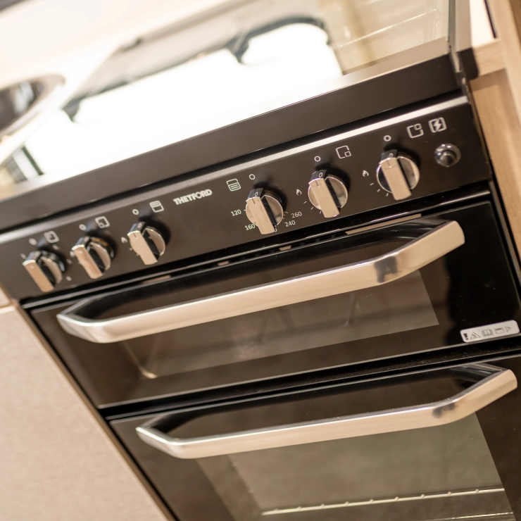 Image of the Thetford oven, grill and hob inside the Whirlwind caravan model by Elddis.