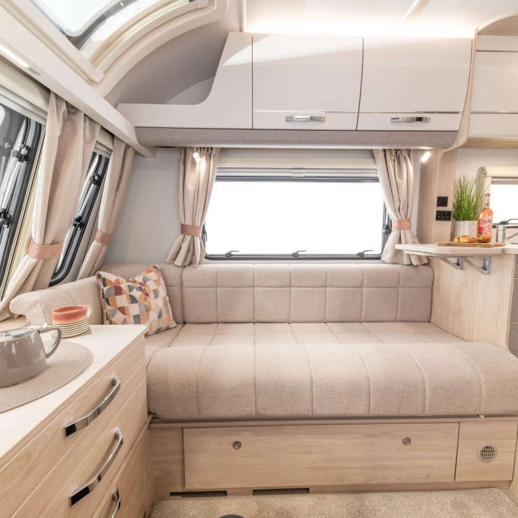 Another image from a different angle of the lounge area inside the Whirlwind 520 model by Elddis.