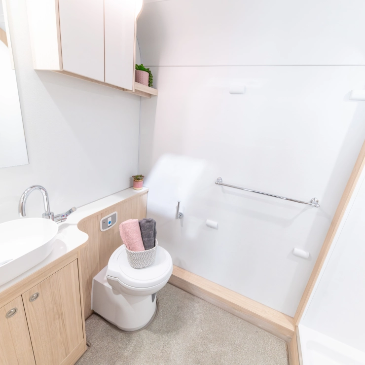 A spacious full width rear washroom in the Whirlwind 520