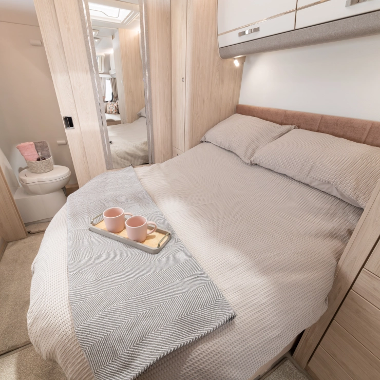 Bedroom of the Whirlwind 554. Showcasing the transverse rear island bed.